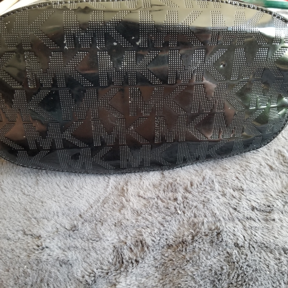 Michael Kors black Shiny coated MK logo with Vachetta leather handles and trim